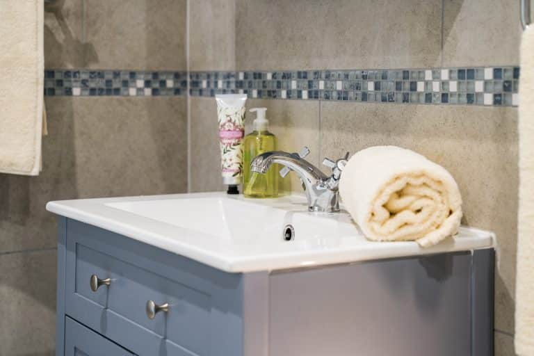 Luxury bathroom with soft hand towels and toiletries